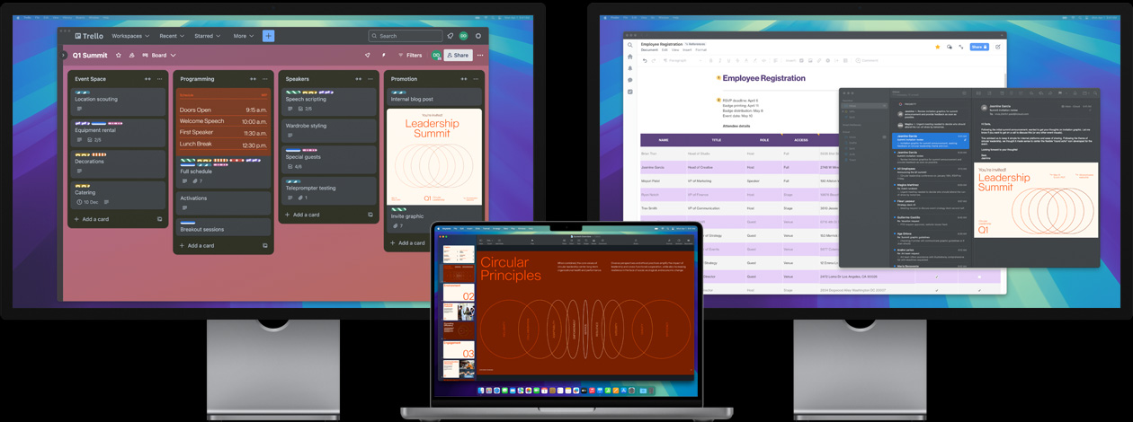 MacBook Pro se dvěma Studio Displayi – aplikace na obrazovkách ukazují, že uživatel připravuje summit vedení firmy, dohlíží na úkoly v aplikaci Trello, chystá prezentaci a kontroluje grafiku poslanou e‑mailem.