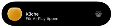 Eine AirPlay Grafik, die zeigt, wie Musik auf einem HomePod mini mit dem Titel „Küche“ abgespielt wird