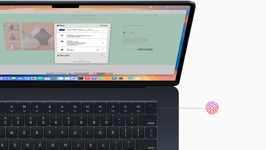 En åben MacBook Pro i farven space black, der viser, hvor Touch ID-knappen er placeret.