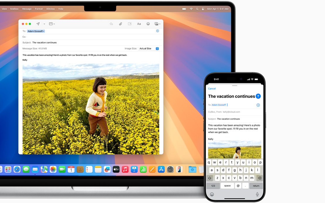 Sebuah iPhone di samping sebuah laptop Mac yang terbuka, menunjukkan kemampuan untuk memulai email di satu perangkat dan melanjutkannya di perangkat lain.