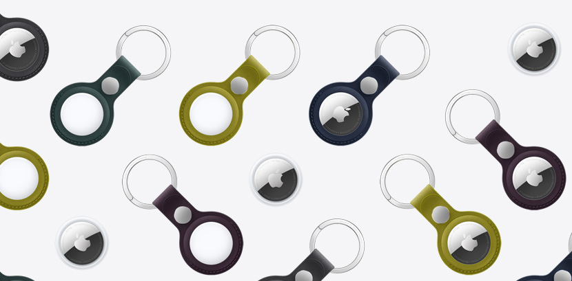 An array of AirTags and AirTags with FineWoven Key Ring in various colors including Chartreuse, Dark Green, Deep Blue, Blackberry, and Black.