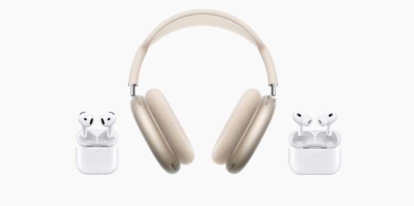 Various Mac accessories, including a black Magic Keyboard with Touch ID, a black Magic Mouse, a black Magic Trackpad, a black accessories cord, and white AirPods inside an open white charging case