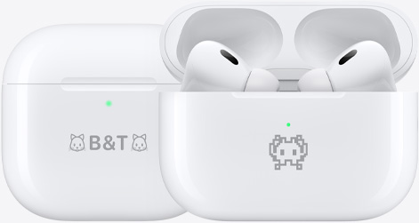 Three MagSafe Charging Cases are engraved with example emojis: a kitten, an I-love-you hand sign, and a smiley face.