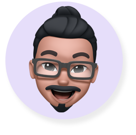 Smiling Memoji face -  a bearded man in glasses