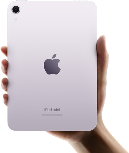 A user holding iPad mini back-facing in one hand to show compact size and portability.