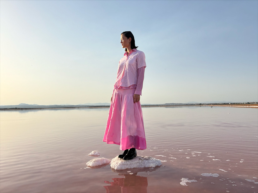 A high-resolution photo of a woman dressed in pink taken with the 48MP Fusion camera