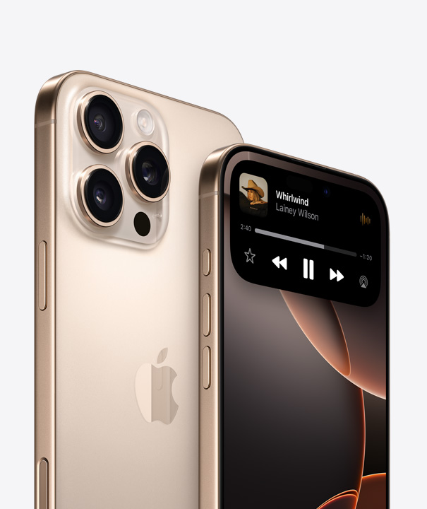 Back of iPhone 16 Pro in Desert Titanium showing three camera lenses behind another iPhone 16 Pro highlighting Dynamic Island capabilities on display screen.