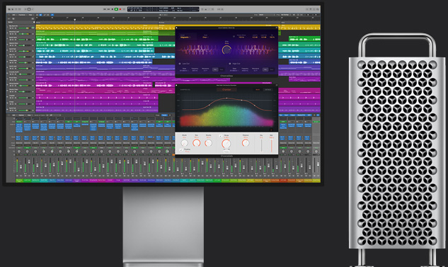 A large multitrack Logic Pro project is on a display next to a Mac Pro.