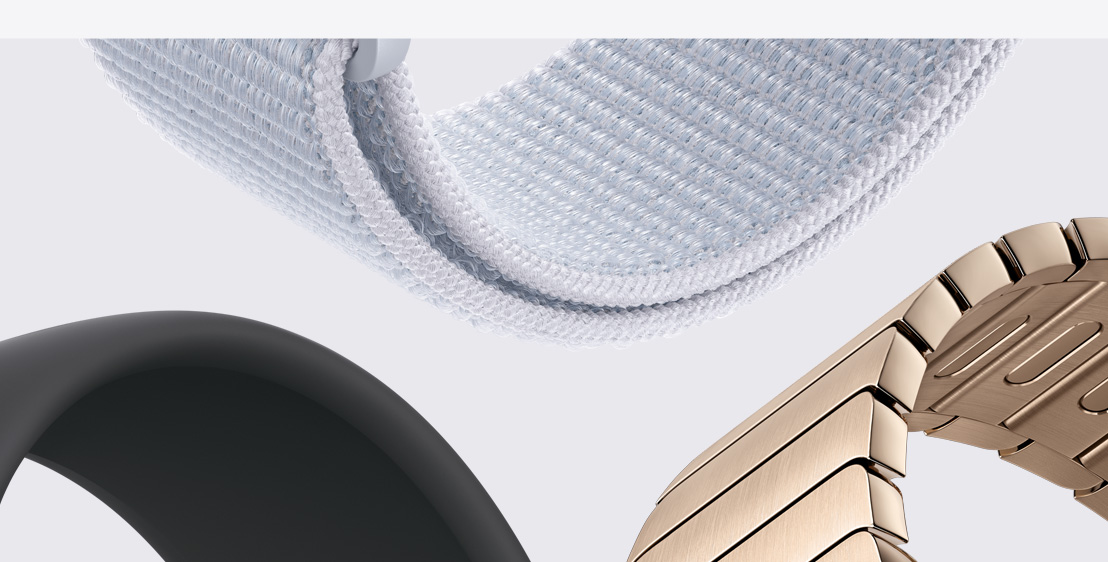 Three Apple Watch straps. A Blue Cloud Sport Loop. A Black Solo Loop. And a Gold Link Bracelet.