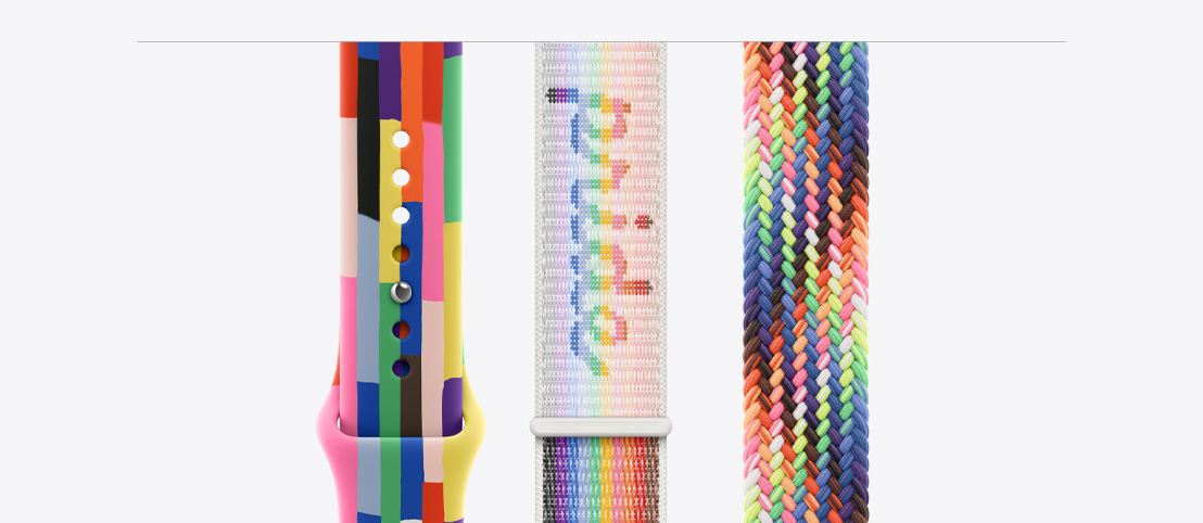 Pride Edition Sport Band, six stripes made of numerous thin rectangles in solid rainbow hues and other colours, slightly uneven edges, smooth fluoroelastomer, pin-and-tuck closure, Pride Edition Sport Loop, features a hook-and-loop fastener, with the word pride woven into the fabric, Pride Edition Braided Solo Loop band, woven in a neon array of colours inspired by the vibrant rainbow Pride flag