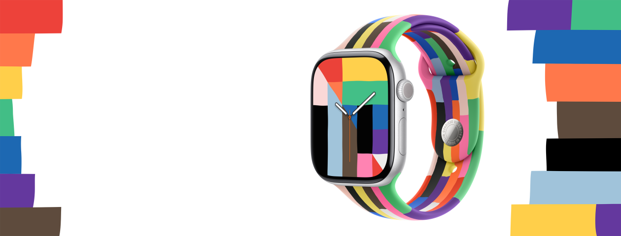 Apple Watch Series 10, silver aluminium case, Digital Crown, Pride Harmony watch face, rectangles, triangles and trapezoids in rainbow and other colours form the number 10, watch hands show the time, connected to Pride Edition Sport Band, six stripes made of thin rectangles in solid rainbow hues and other colours, slightly uneven edges, solid coloured stripes in various rainbow colours and shapes surround watch on either side