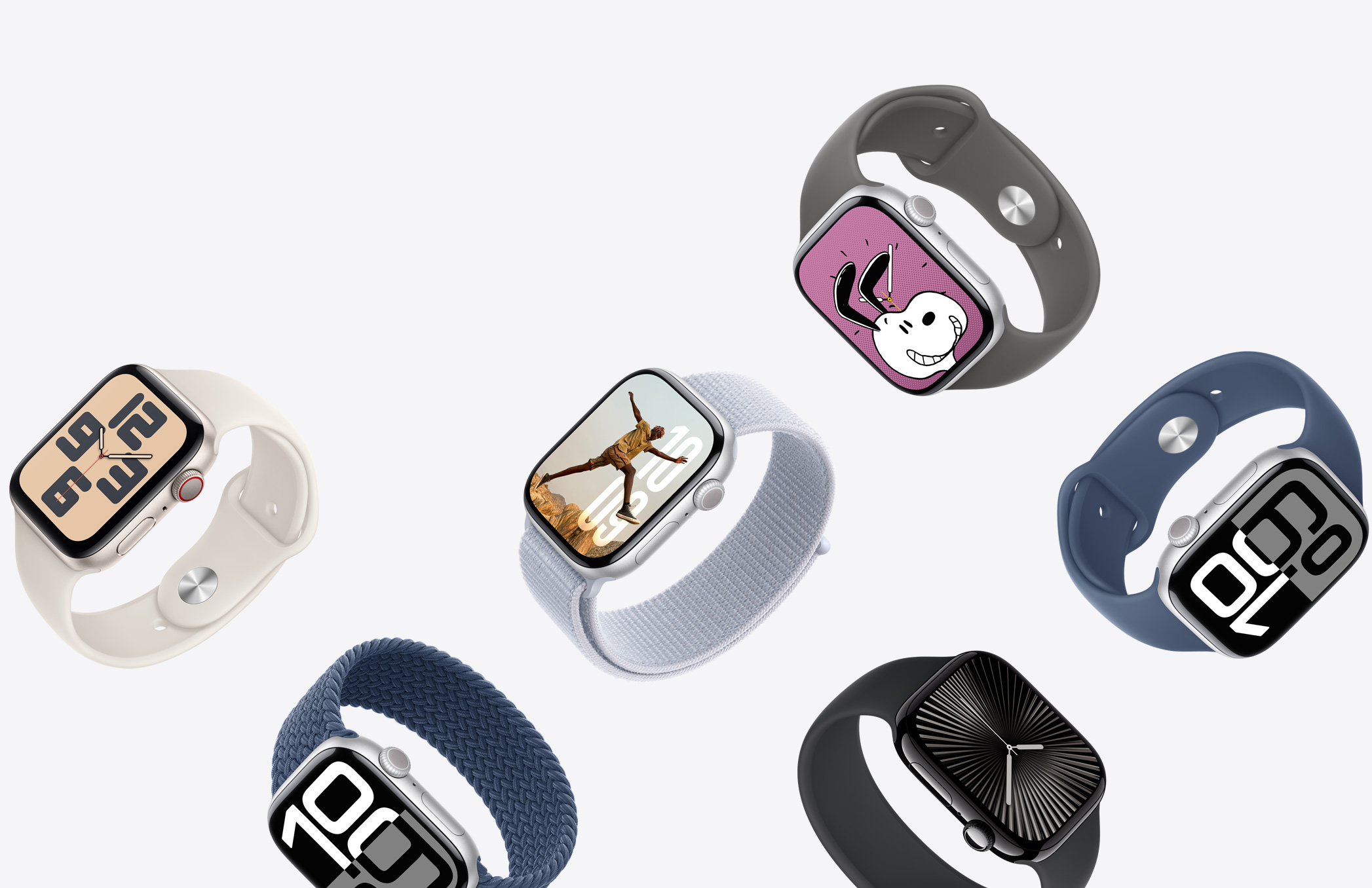 A selection of Apple Watch devices with different case finishes and a variety of strap colours and materials.